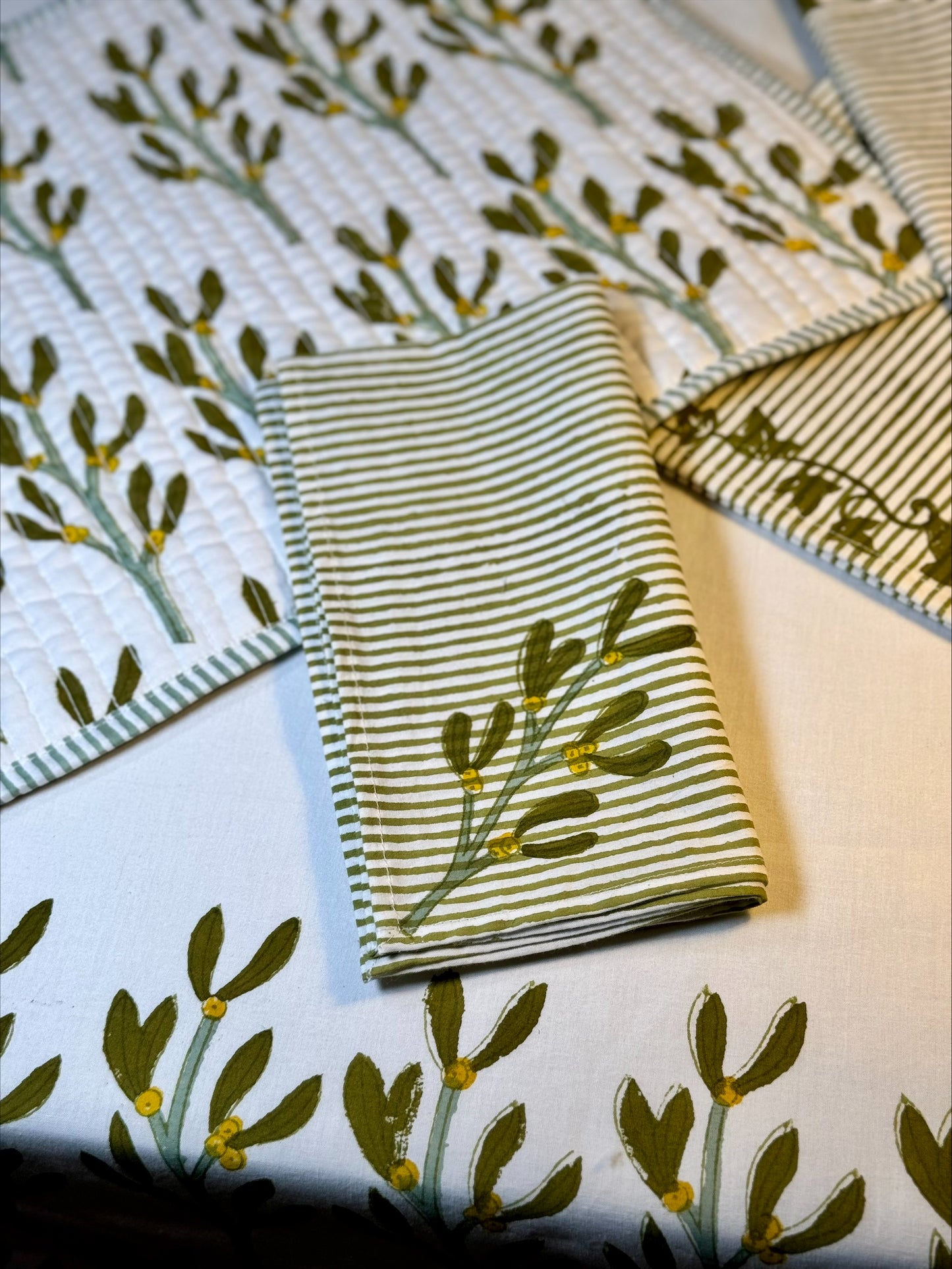 Hand block printed olive green mistletoe napkins - set of 2