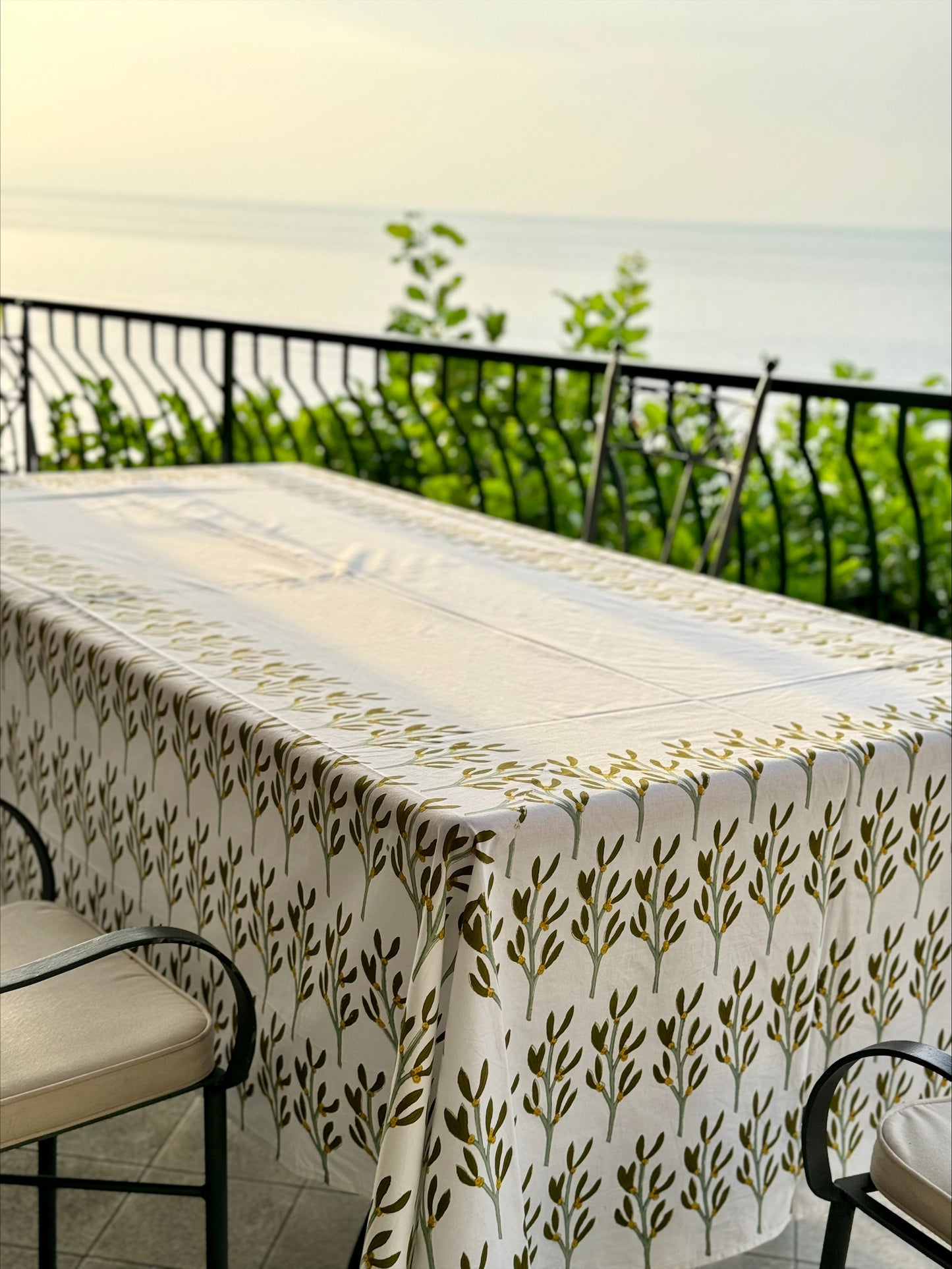 Hand block printed olive green mistletoe tablecloth